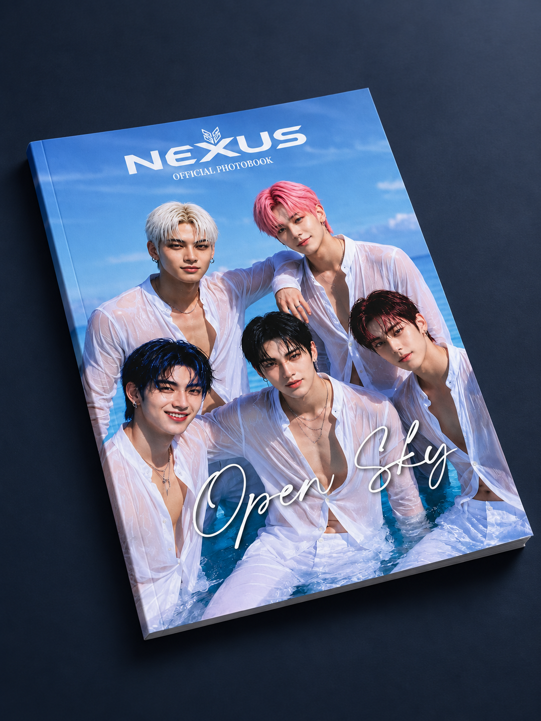Open Sky photobook shown as a physical softcover book with the five members on the front cover